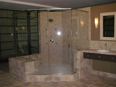 frameless shower enclosure with header