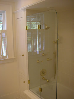 frameless bifold tub enclosure